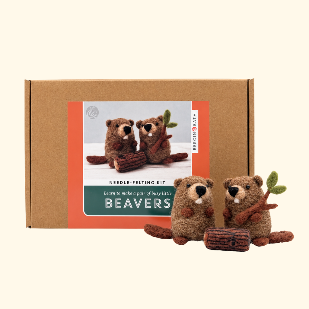 Bergin And Bath Set Of 2 Beavers Needle Felting Kit displayed alongside two finished brown wool beavers sitting on a miniature wooden log.