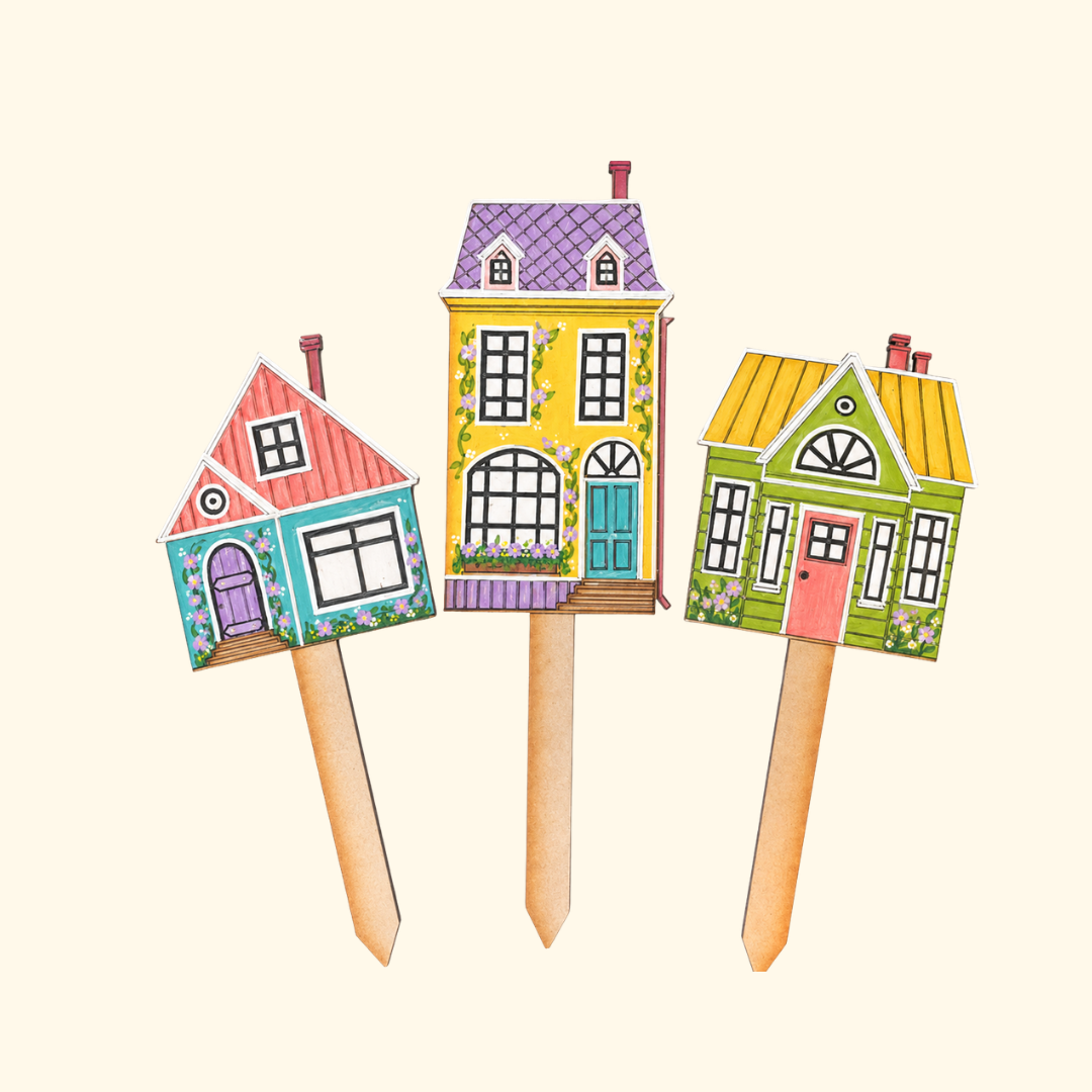 Set of three colourful finished cottage plant stakes from the Paint Your Plant Stakes Kit by DIY The Hell Not.