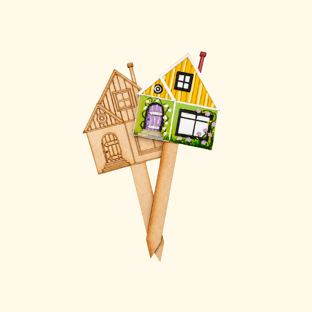 Painted and unpainted cottage plant stakes showing the DIY craft kit before and after completion.
