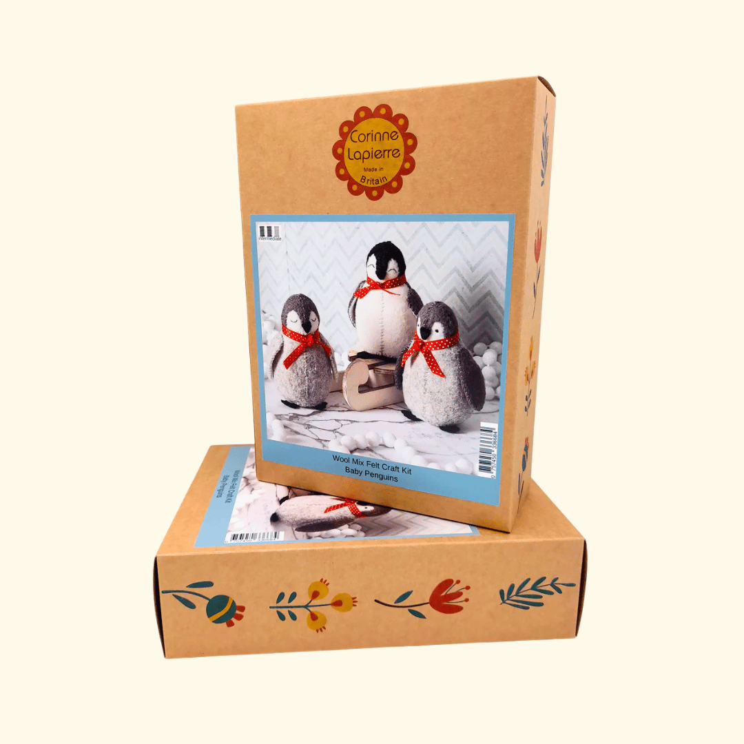 Set of 3 Penguin Felt Craft Kit by Corinne Lapierre displayed in its recyclable retail packaging.