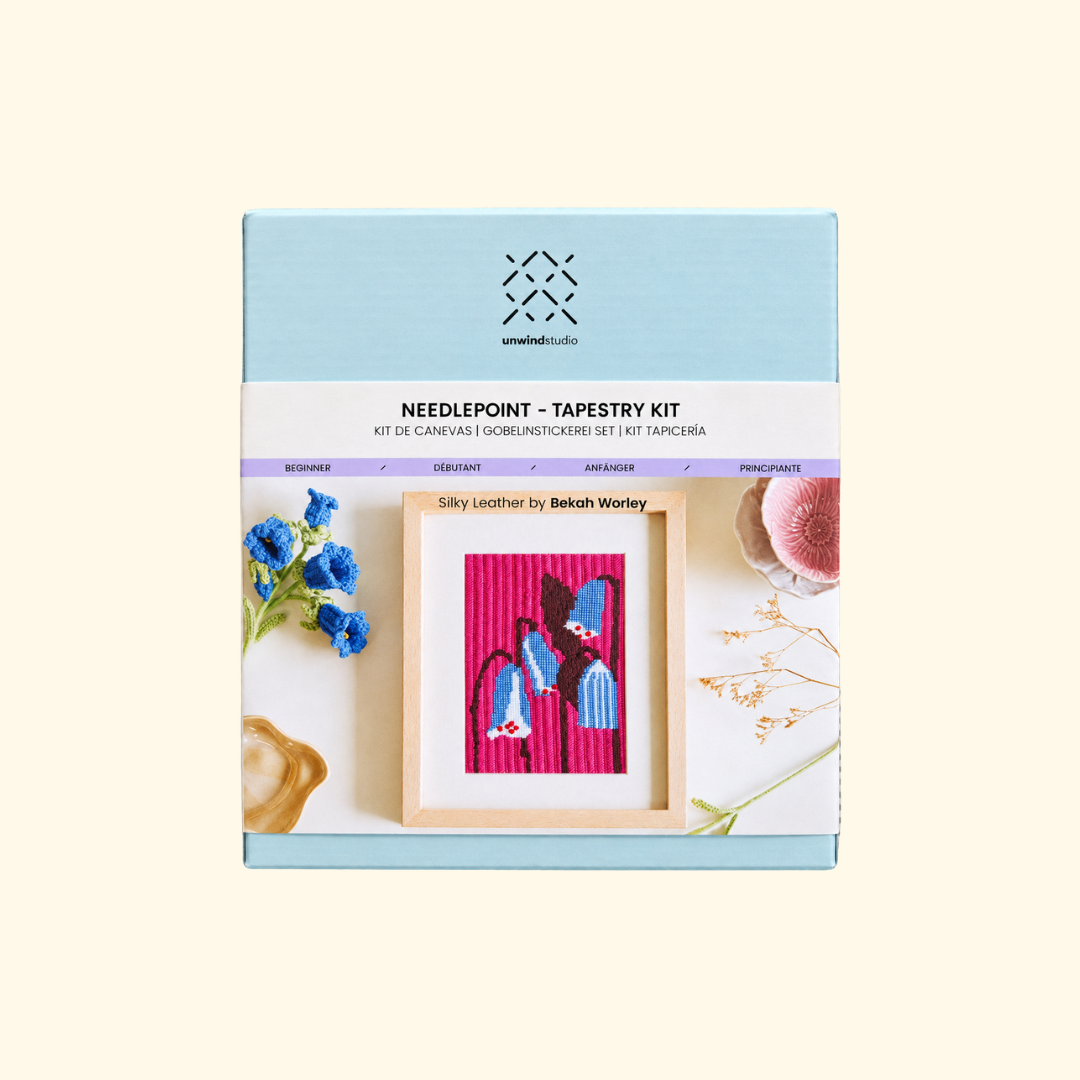 Silky Leather Needlepoint Kit by Unwind Studio with pre-printed canvas and pale blue packaging