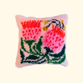 Finished Sugarbush latch hook cushion featuring a pink sugarbush flower design.