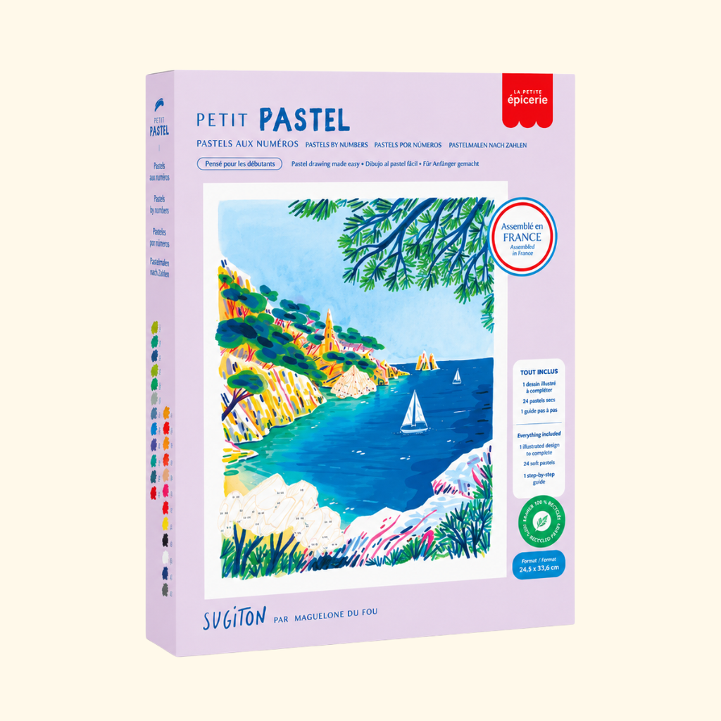 Sugiton Cove Pastels By Numbers Kit by La Petite Epicerie in its original packaging featuring a vibrant illustration of the French Mediterranean coastline.