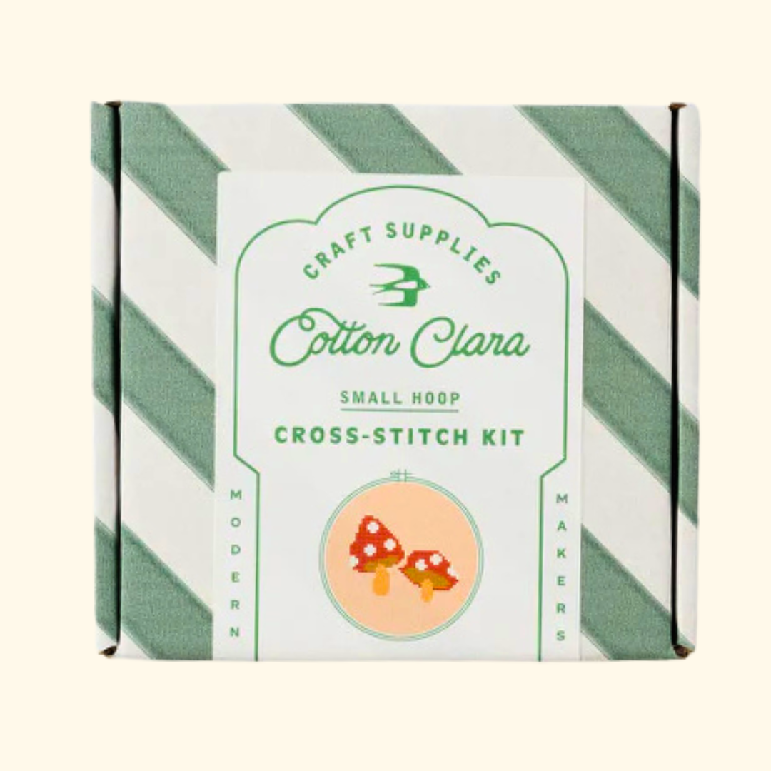Cotton Clara Toadstools Cross Stitch Kit in striped gift box packaging.
