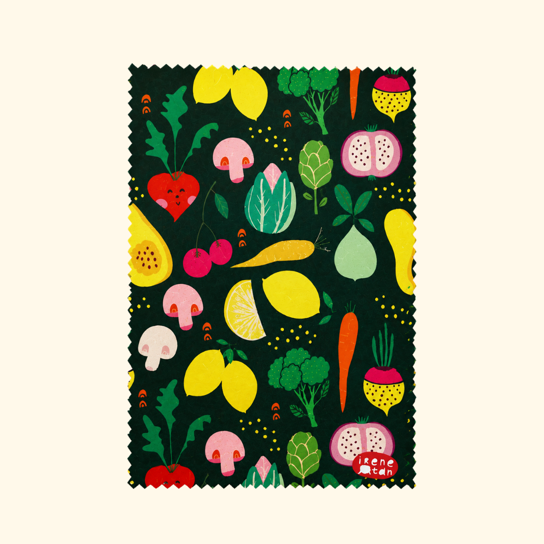 Veggie Land microfibre cloth by Missy Minzy featuring a colourful illustrated vegetable pattern on a black background.