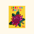 Waratah embroidered iron on patch by Missy Minzy displayed on bright yellow packaging.
