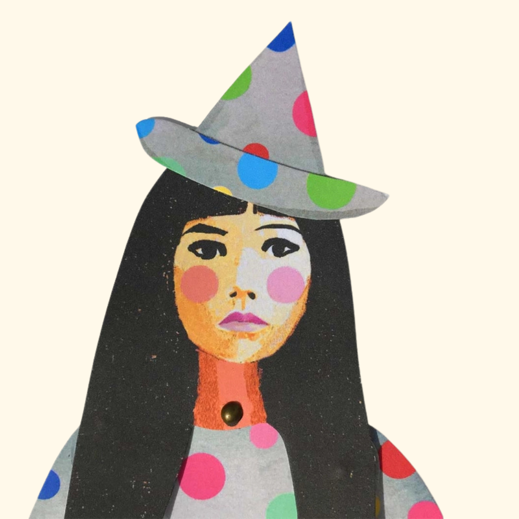 Yayoi Kusama articulated paper puppet detail with colourful polka dot outfit and hat
